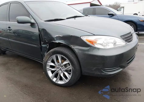 2002 Toyota Camry Xle z USA, uszkodzony, nr VIN 4T1BE30KX2U600688